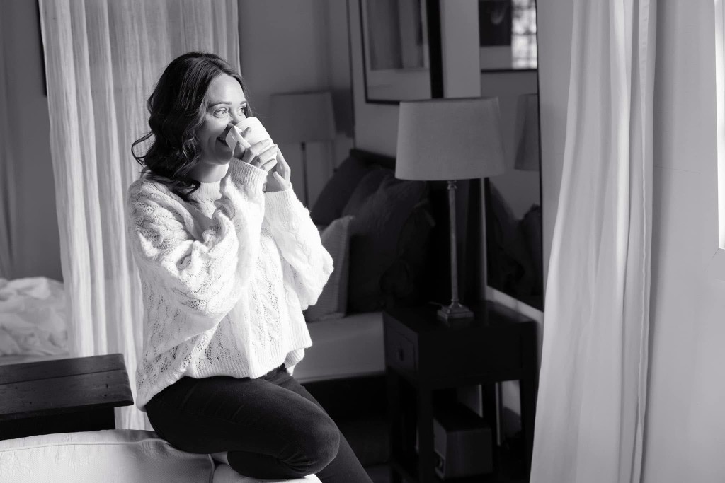 Sarah Smith enjoying a calm moment with a cup of tea